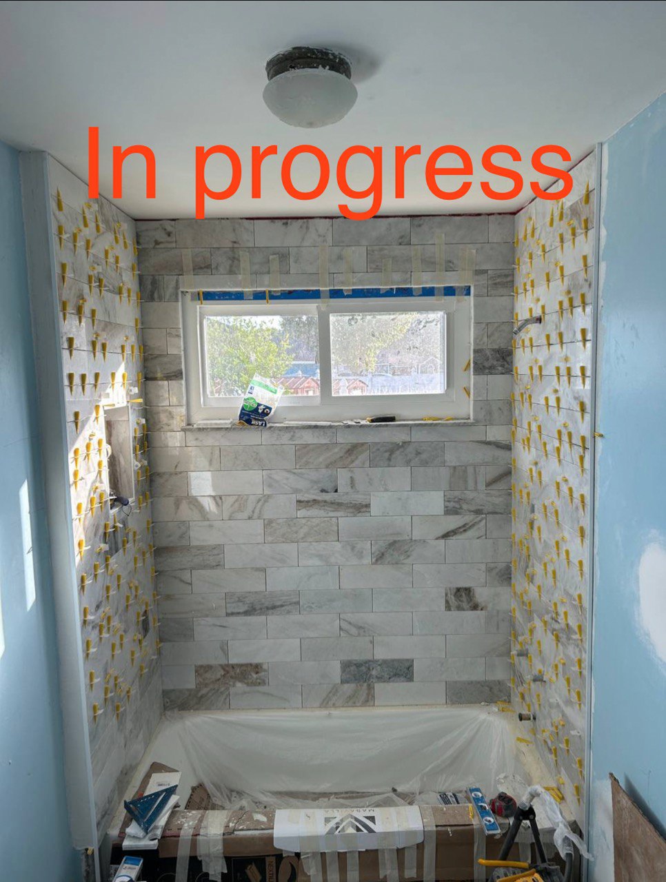In Progress Installing Bathroom Tiles